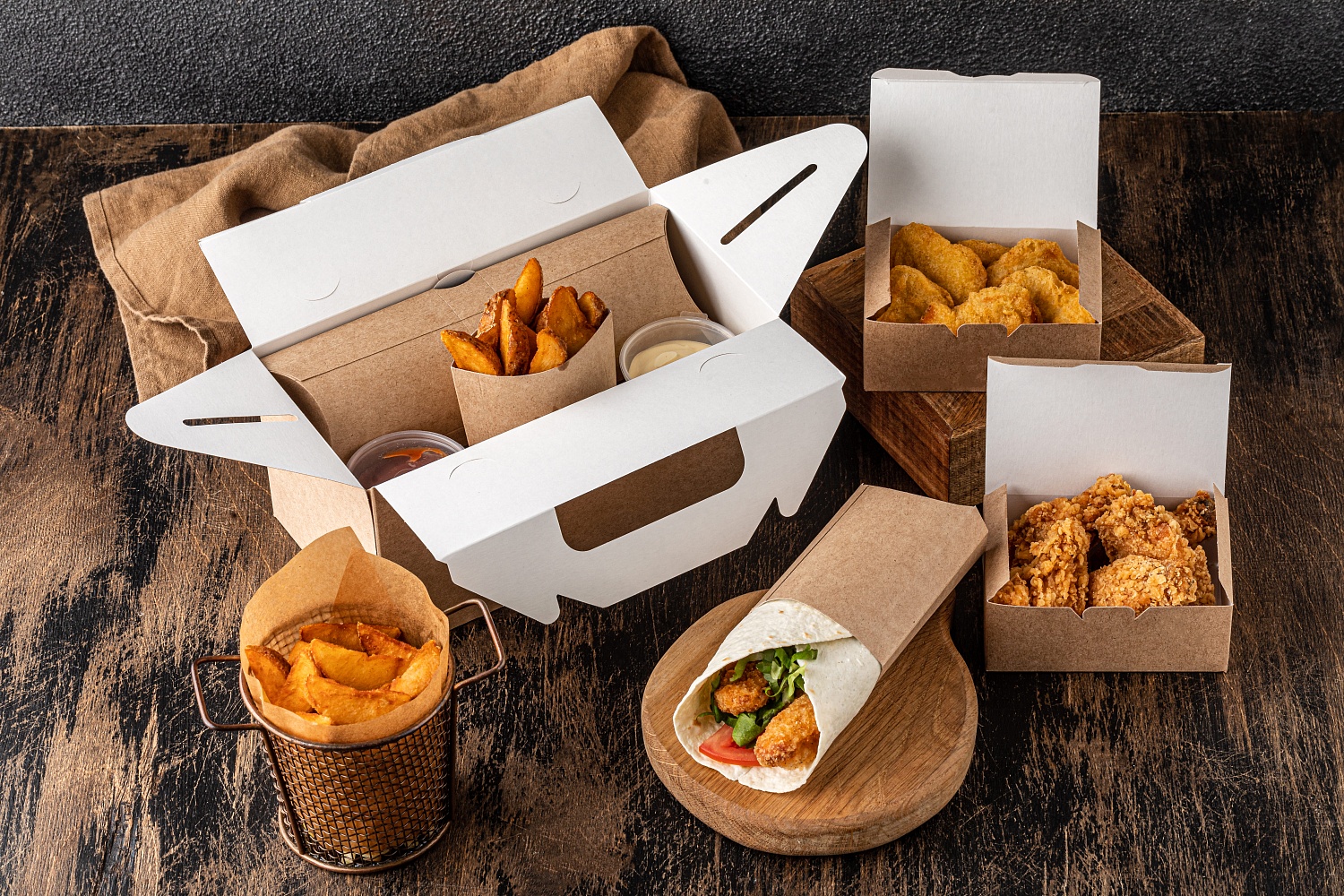 Новинка в ассортименте - картонная упаковка с ручками для сегмента Take Away